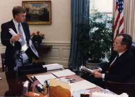 President George Bush and Vice President Dan Quayle talking in the Oval Office